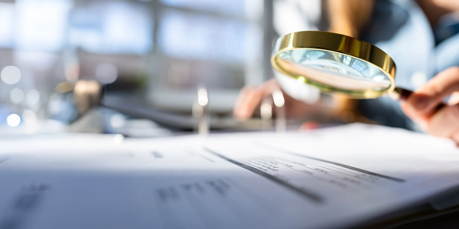 business woman reviewing internal documents