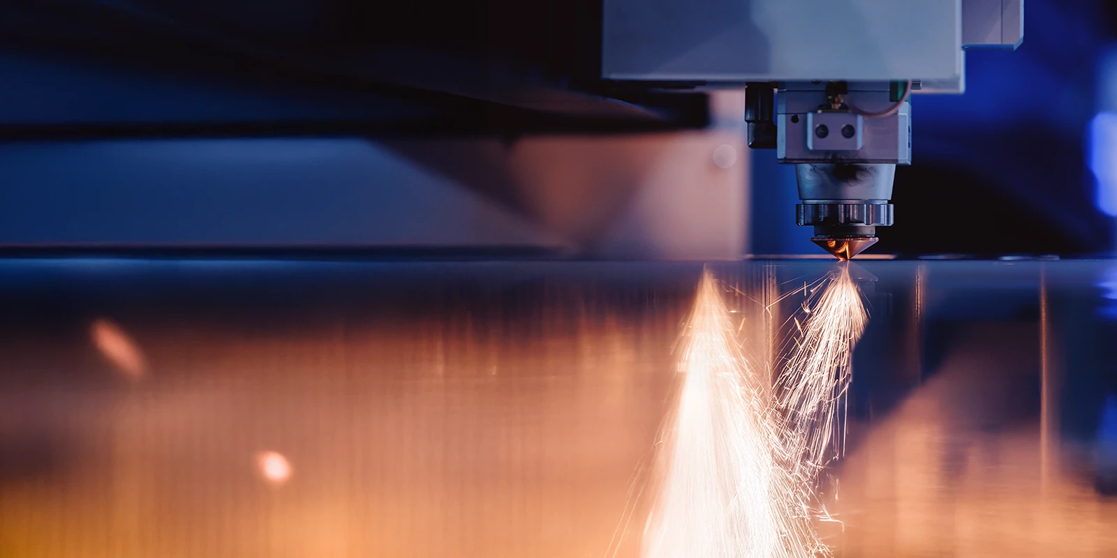 Close up of a CNC machine cutting metal