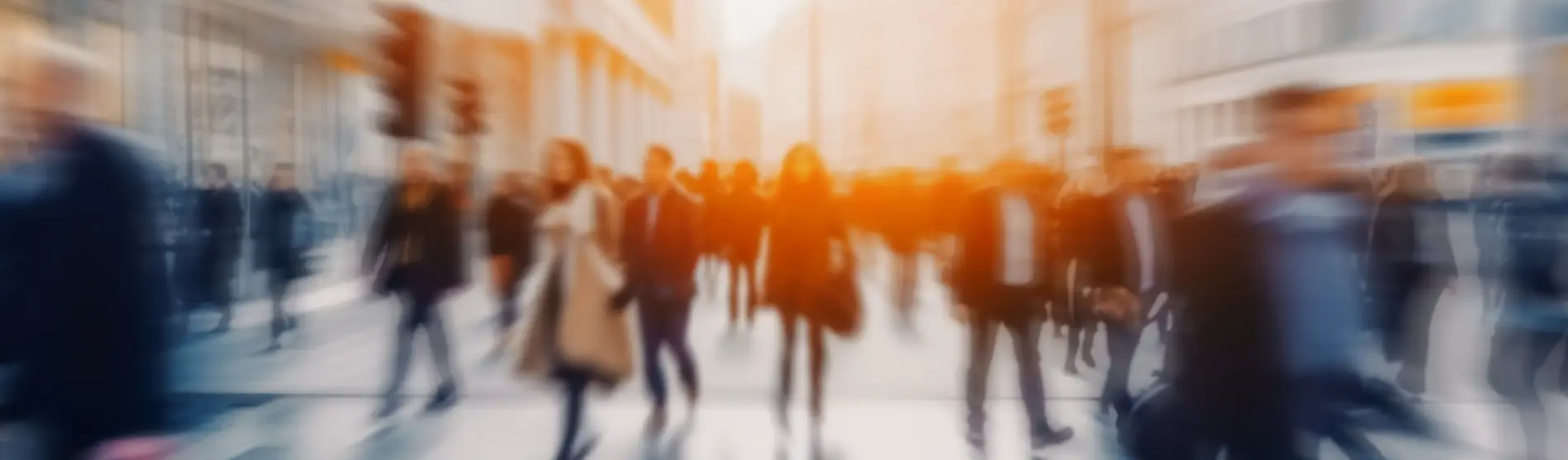 Business people walking in a blurry background.