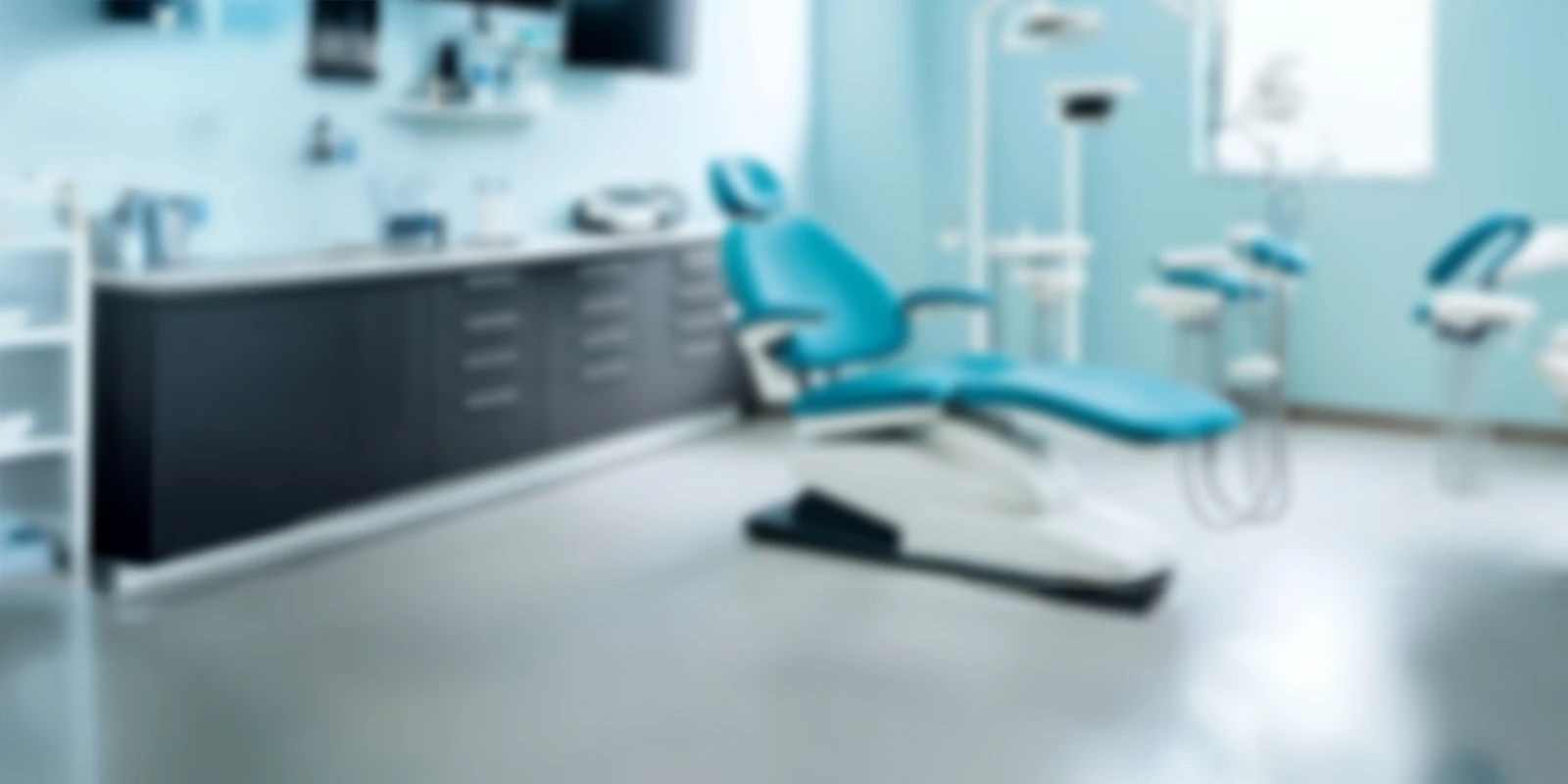 Blurred photo of a dentist office.