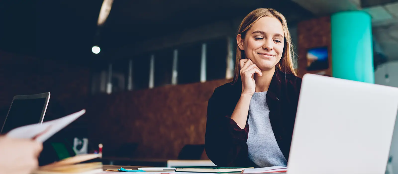 Successful business person at laptop computer