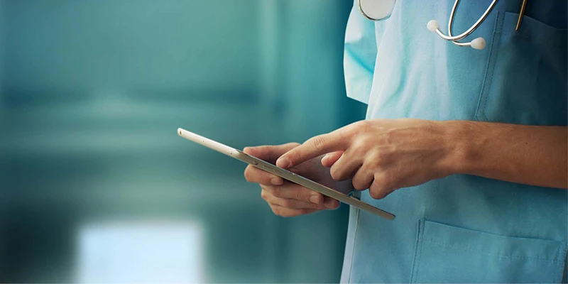 Healthcare And Medicine Doctor using a digital tablet