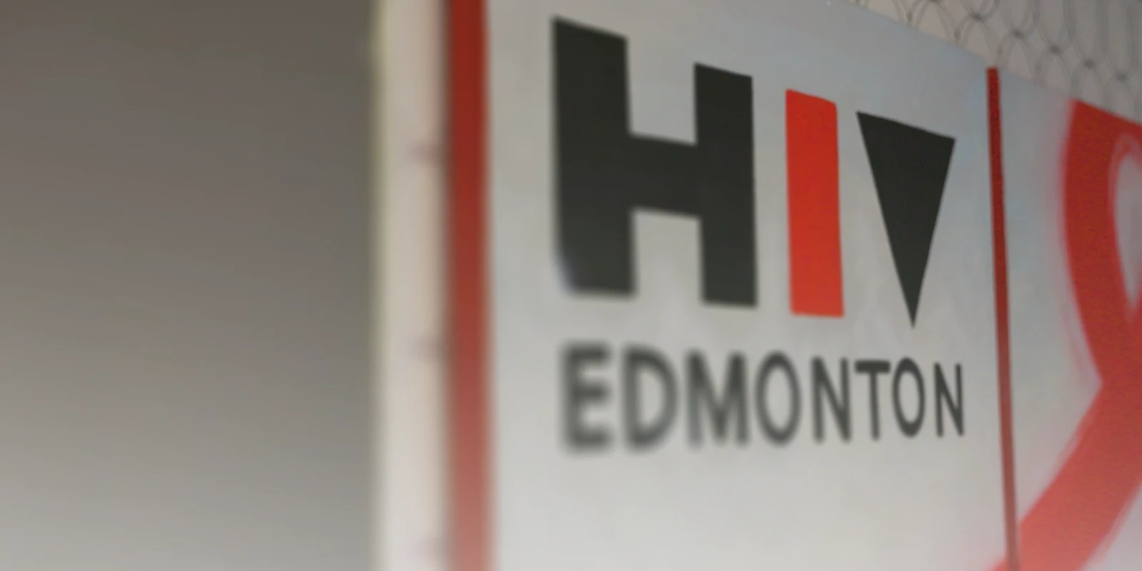 Close up view of the HIV Edmonton sign in the office