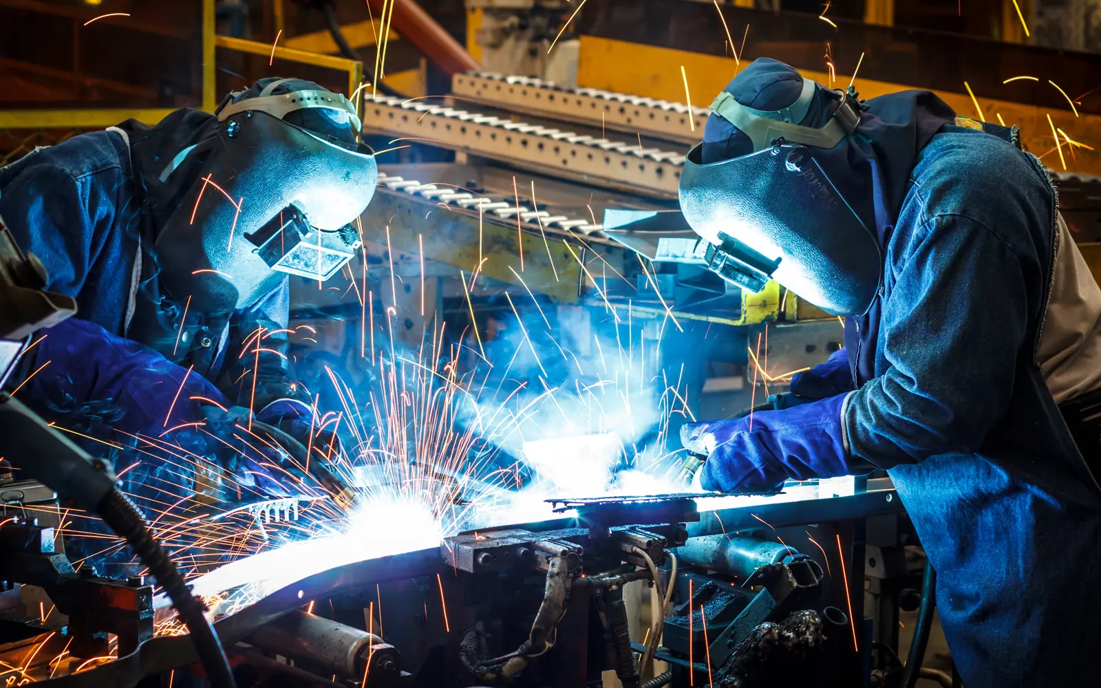 two welders working