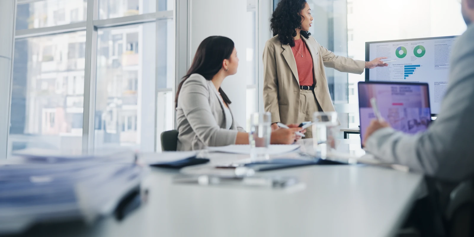 business leader presenting in a boardroom