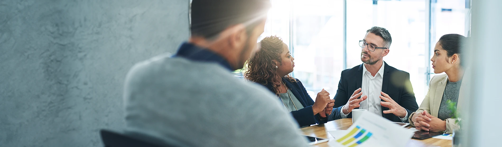 diverse business team discussing an acquisition