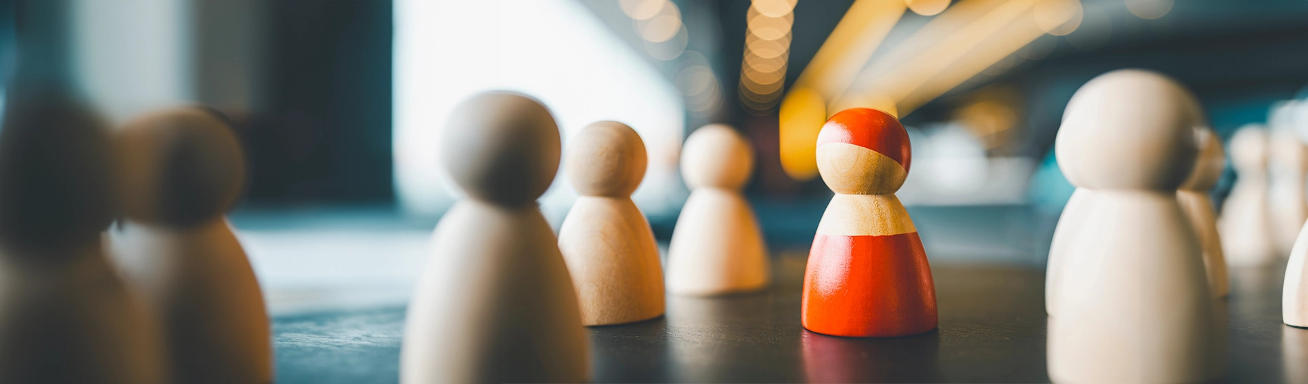 Building blocks representing people with one left out, representing workplace misconduct