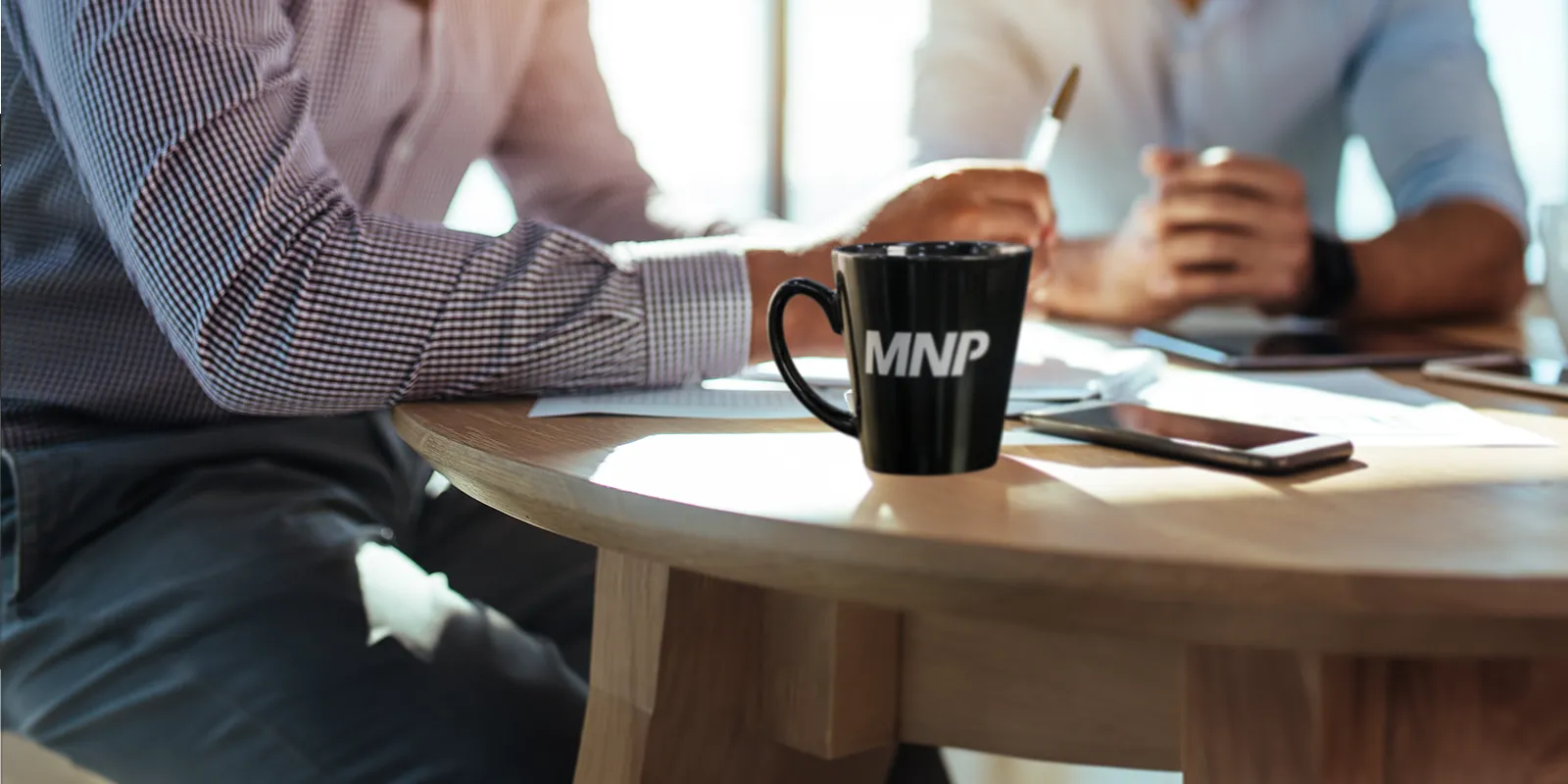 Business advisor having a discussion over coffee